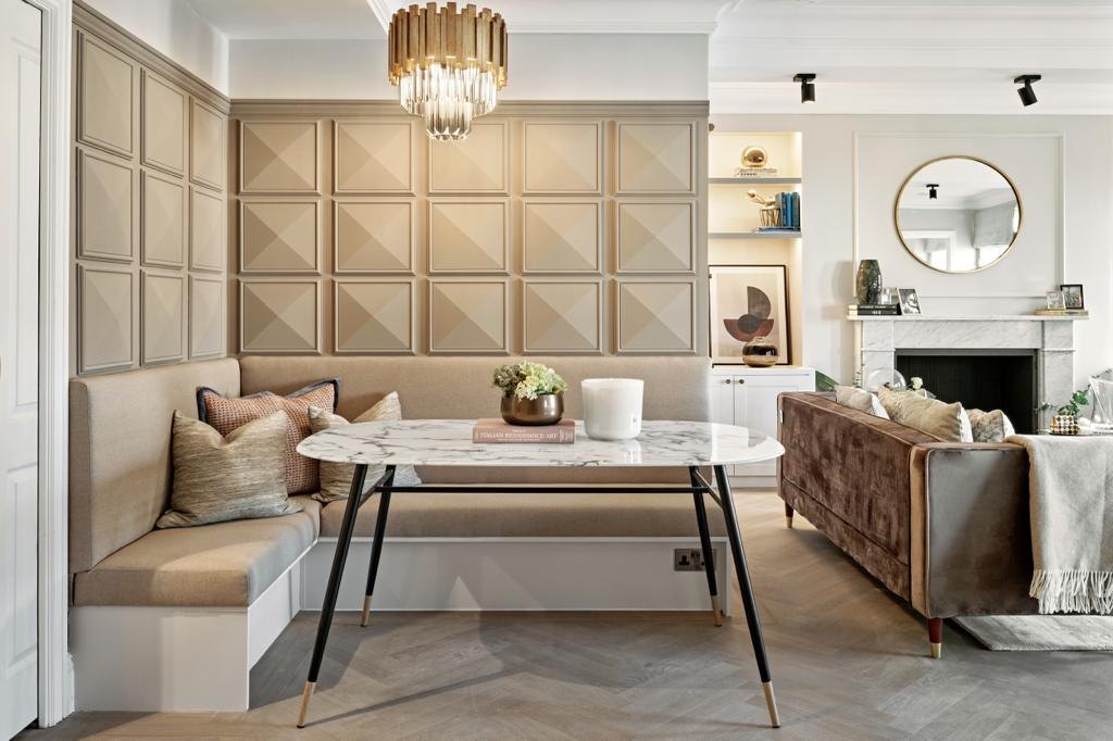 Dining banquette with upholstered panelled wall