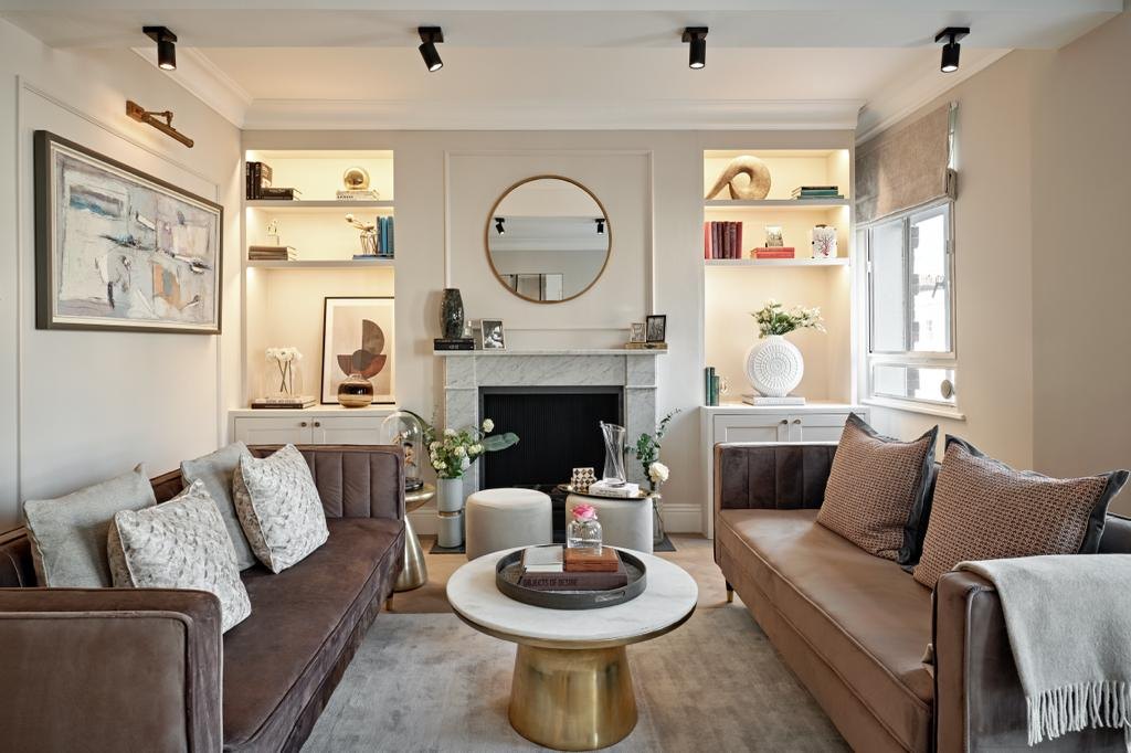 Living room refurbishment with bespoke alcove shelving and panelling