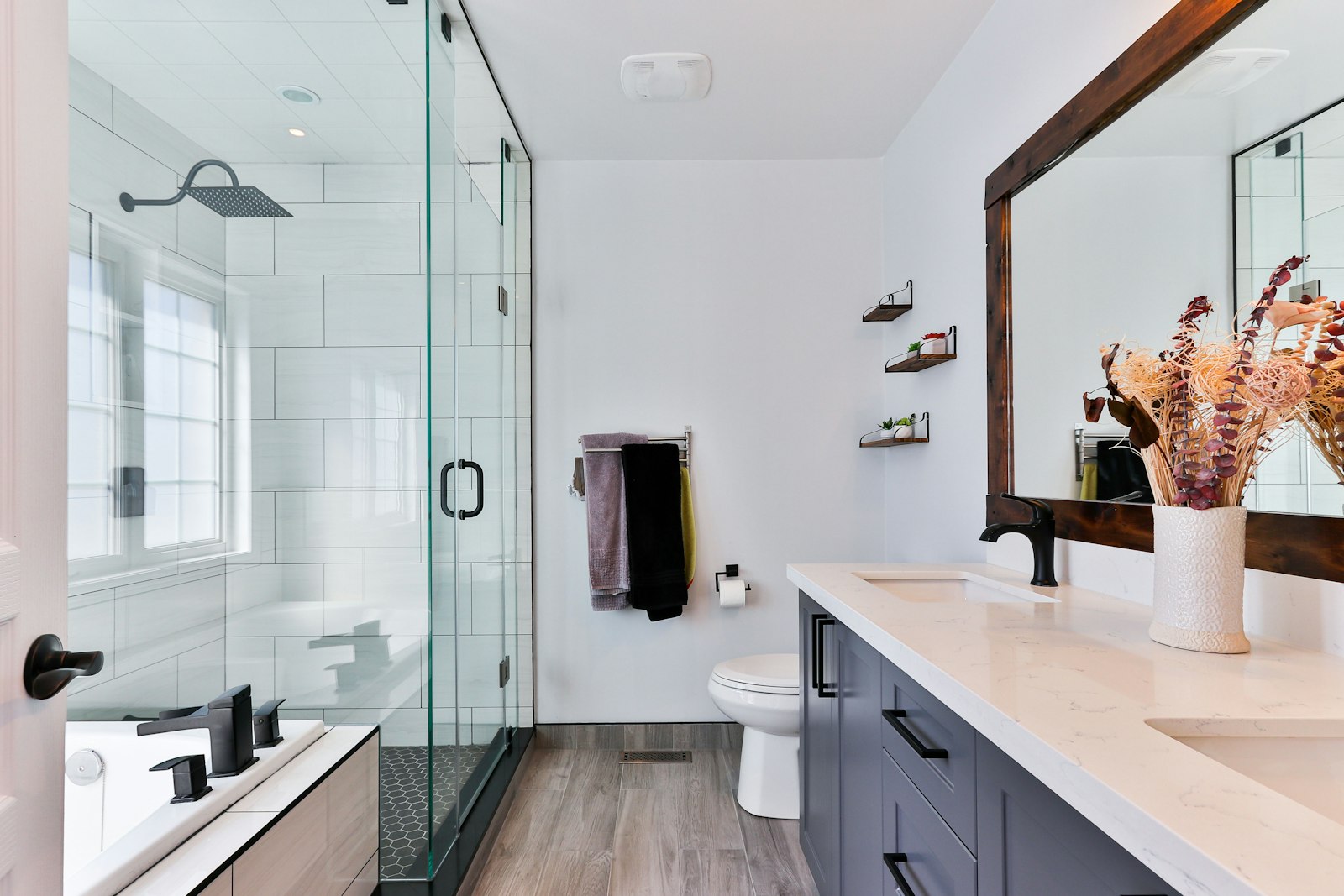Modern wet room with walk-in shower added as part of a garage conversion