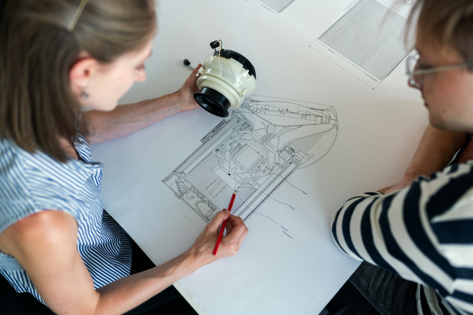Reviewing architectural drawings for a house extension